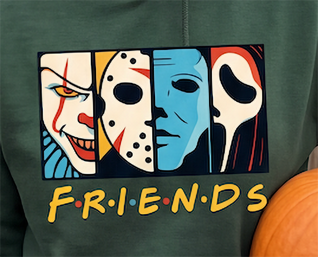 Close-up of colorful Horror Friends horror movie character graphic on forest green hoodie.