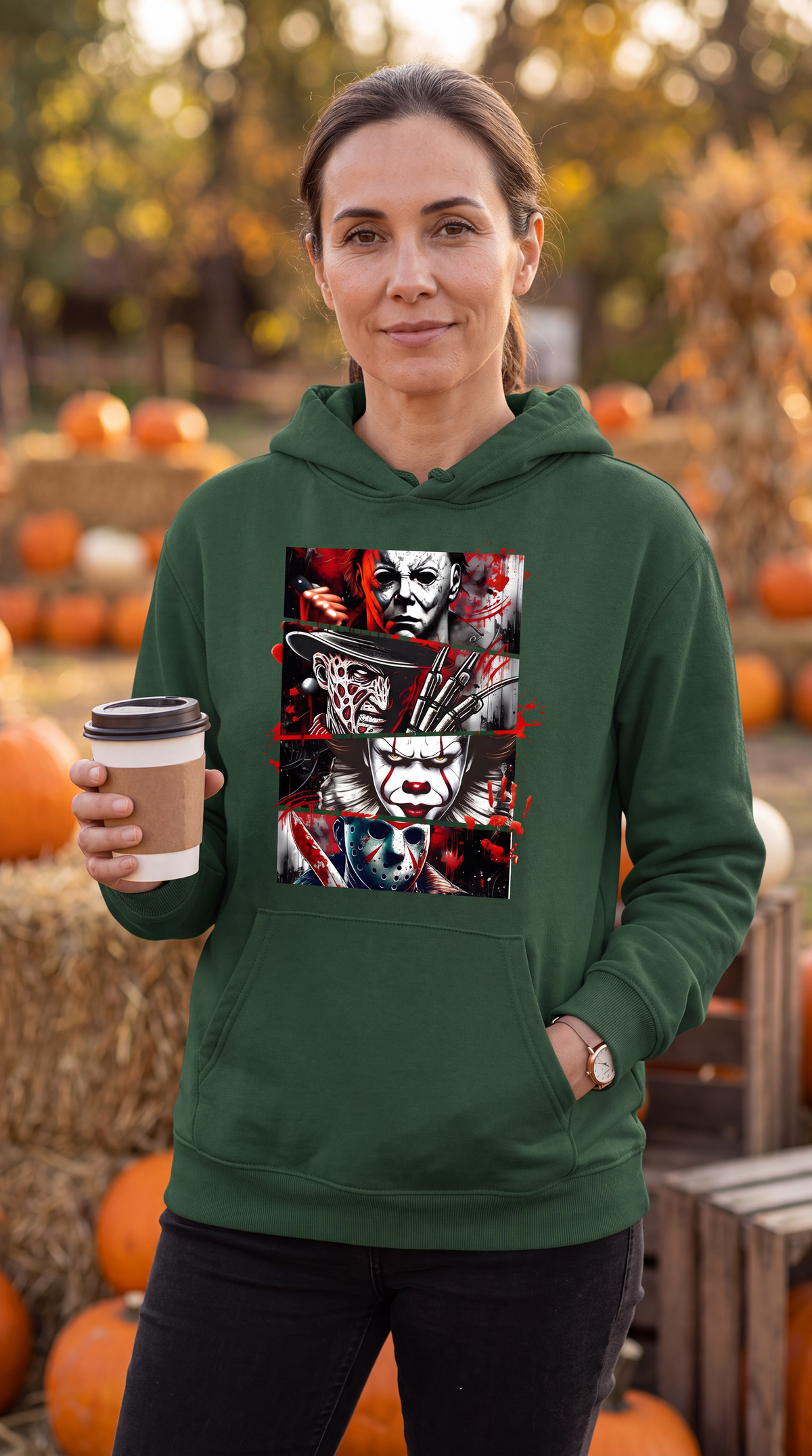 Woman wearing forest green horror movie icons hoodie at Halloween display