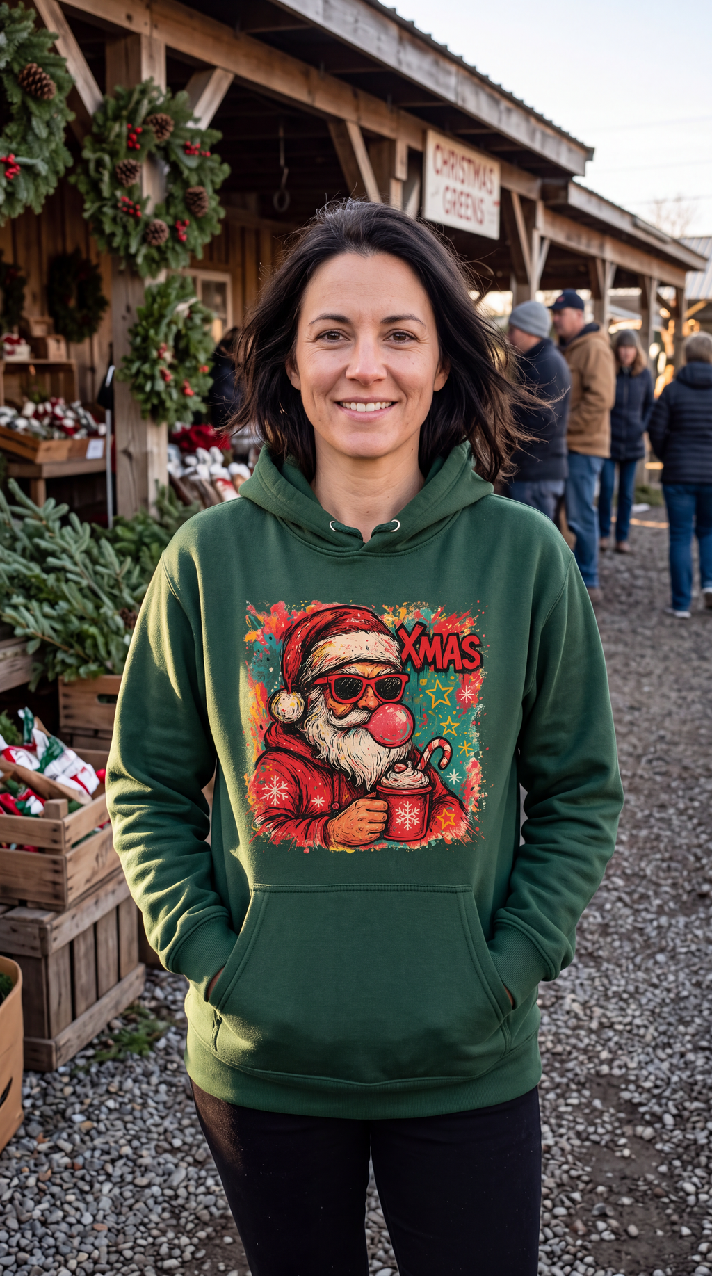 Woman wearing forest green retro Santa Christmas hoodie with Bubblegum Santa design