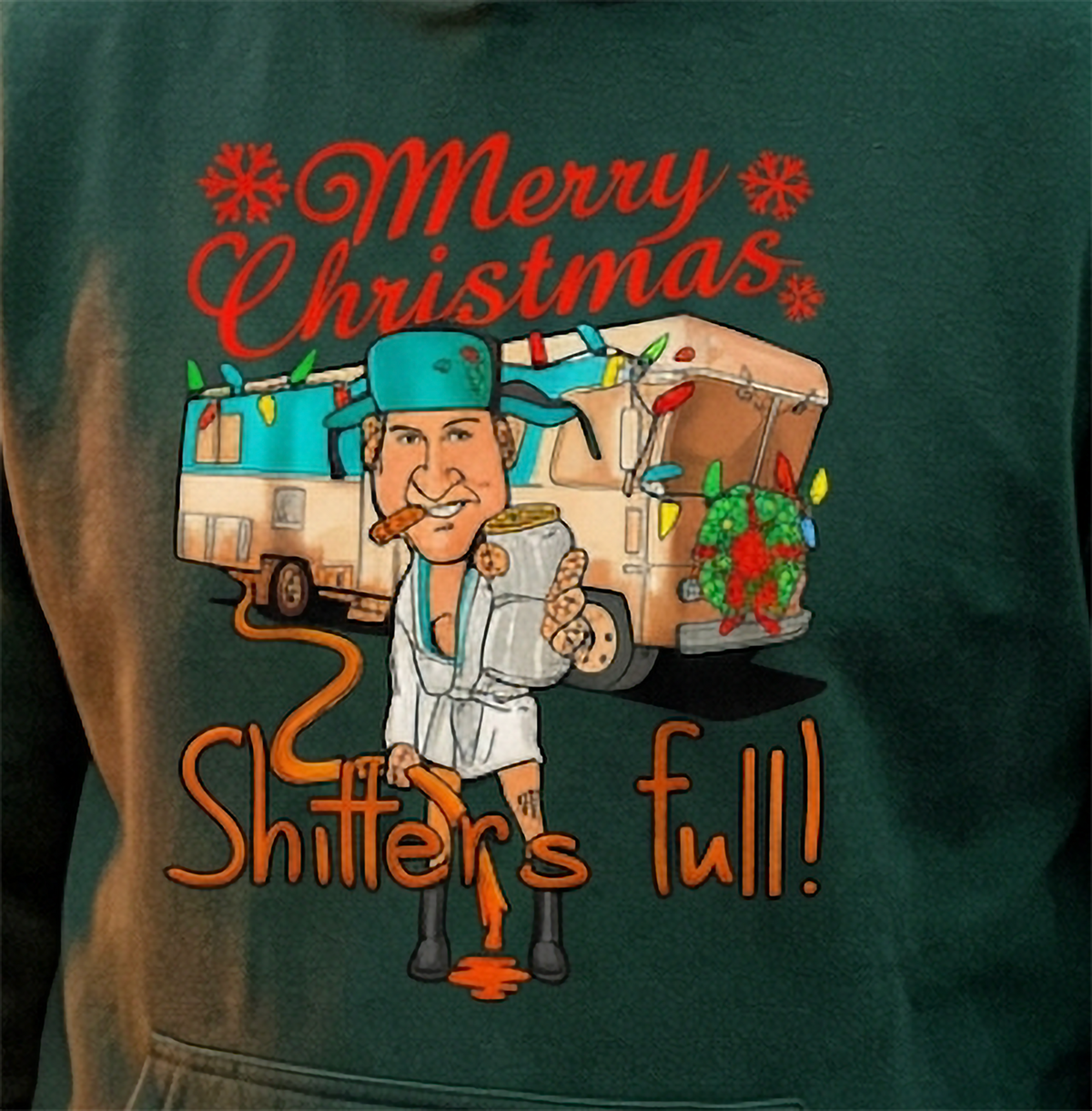 Close-up of Shitter’s Full Cousin Eddie Christmas graphic on forest green hoodie