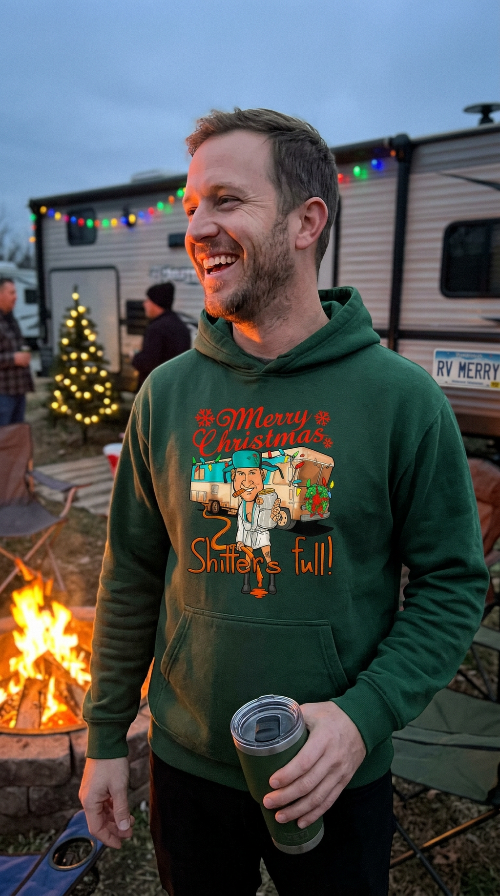 Man wearing forest green Shitter’s Full Cousin Eddie Christmas hoodie outdoors