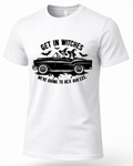 A white short-sleeve crewneck t-shirt with a black graphic print on the front. The graphic features a vintage car with two witches riding in it, surrounded by bats, with the text 'GET IN WITCHES' above and 'WE'RE GOING TO HEX OUR EX.