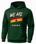 A dark green pullover hoodie with a front graphic that reads 'WE ARE GHANA' above and below a distressed Ghana flag design, shown on a plain white background.