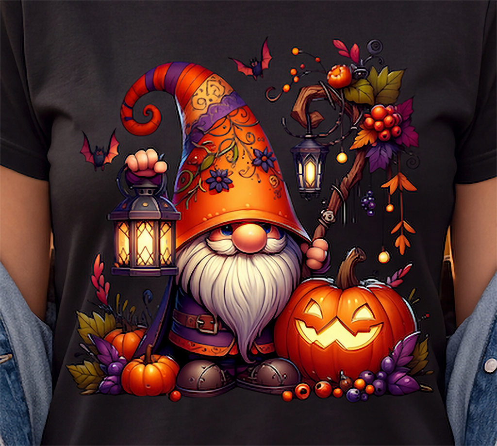 Close-up of Halloween gnome design with glowing jack-o-lantern, lantern, pumpkins, bats and autumn foliage
