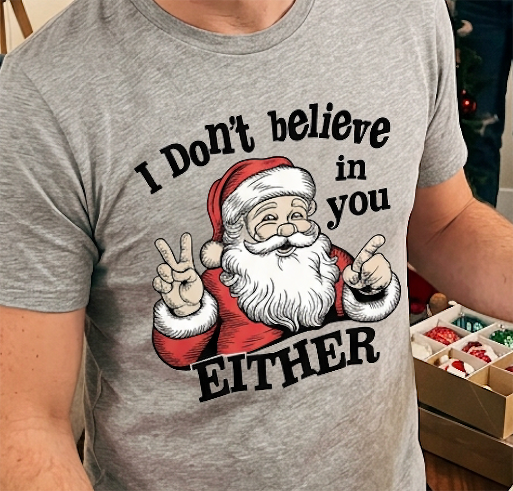 Close-up of heather gray Christmas graphic shirt featuring Santa Claus and I Don't Believe in You Either lettering.