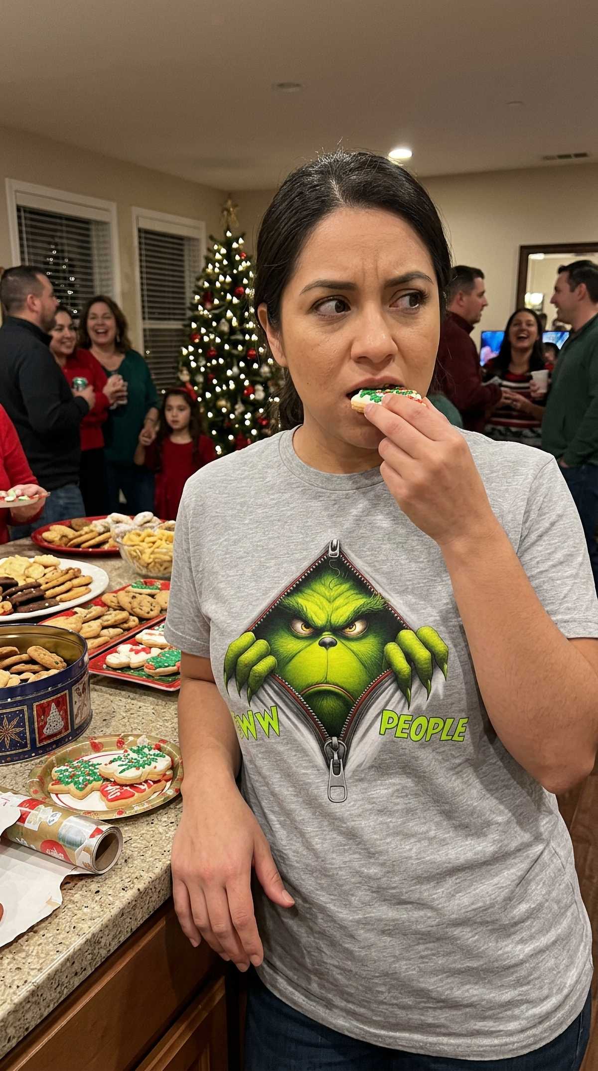 Heather Gray Lifestyle: Woman wearing a heather gray Eww People Christmas graphic t-shirt at a holiday gathering.