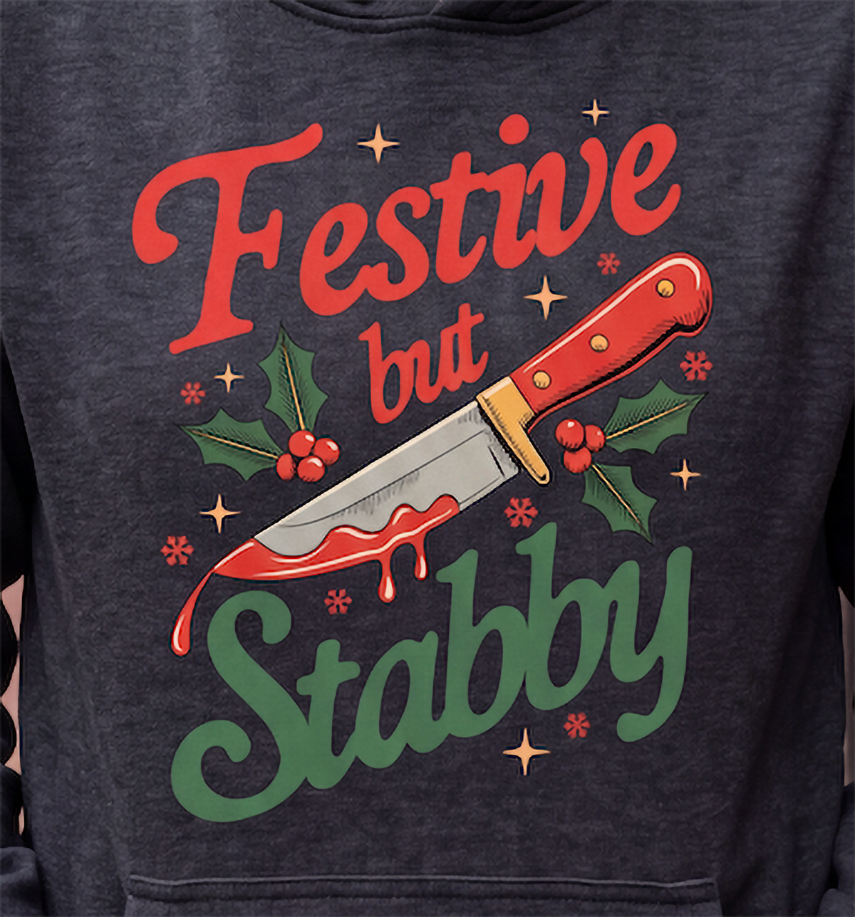 Close-up of gray funny Christmas hoodie with Festive But Stabby graphic