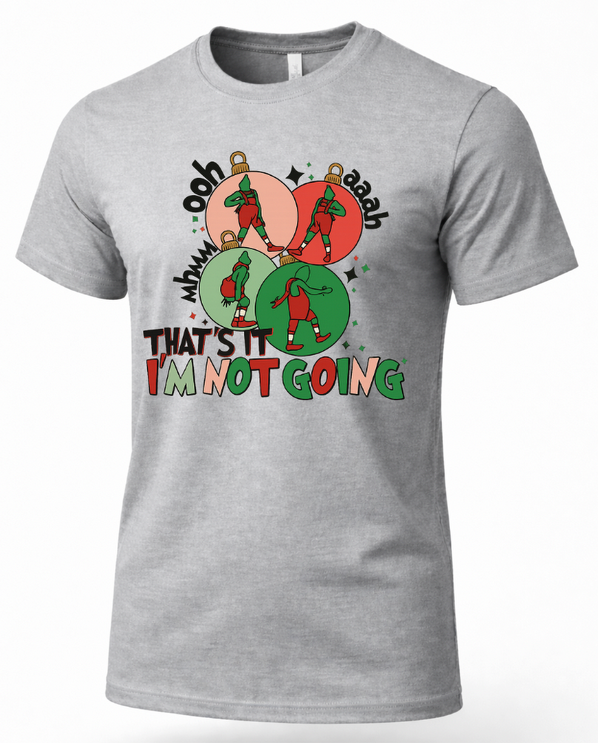 Heather Gray Mockup: Heather gray unisex Christmas t-shirt featuring colorful ornaments, dancing green characters, and funny holiday text.