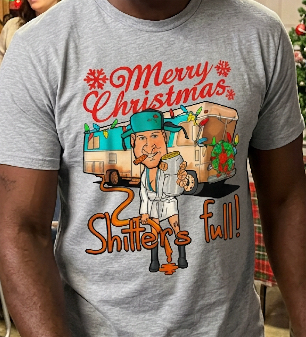 Heather Gray Design Close-Up: Close-up of heather gray Christmas graphic shirt featuring colorful holiday artwork and humorous Shitter's Full lettering.