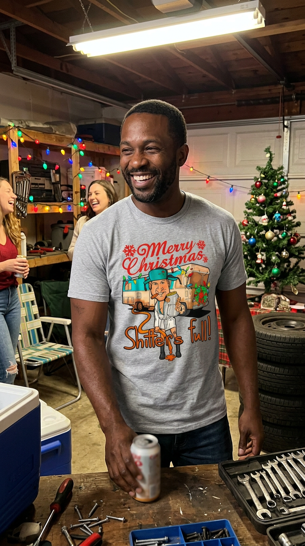 Lifestyle – White: Man wearing a white Christmas Vacation-inspired graphic t-shirt while standing indoors near holiday decorations.