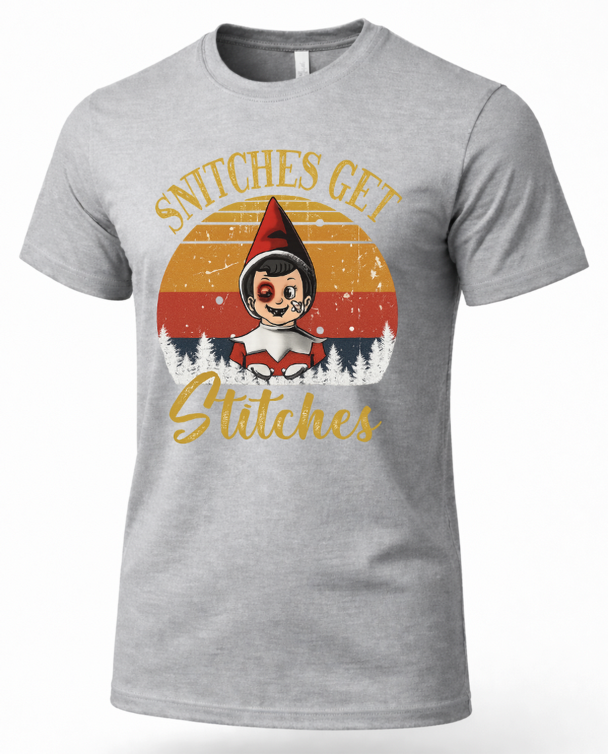 Heather gray unisex Christmas graphic t-shirt with Snitches Get Stitches elf design and vintage sunset background.