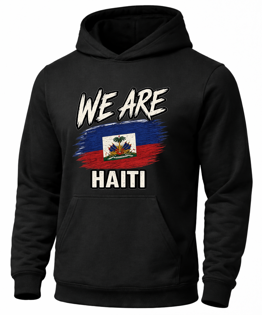 A black pullover hoodie featuring a graphic print on the front with the text 'WE ARE' above a distressed Haitian flag and 'HAITI' below, shown on a plain white background.