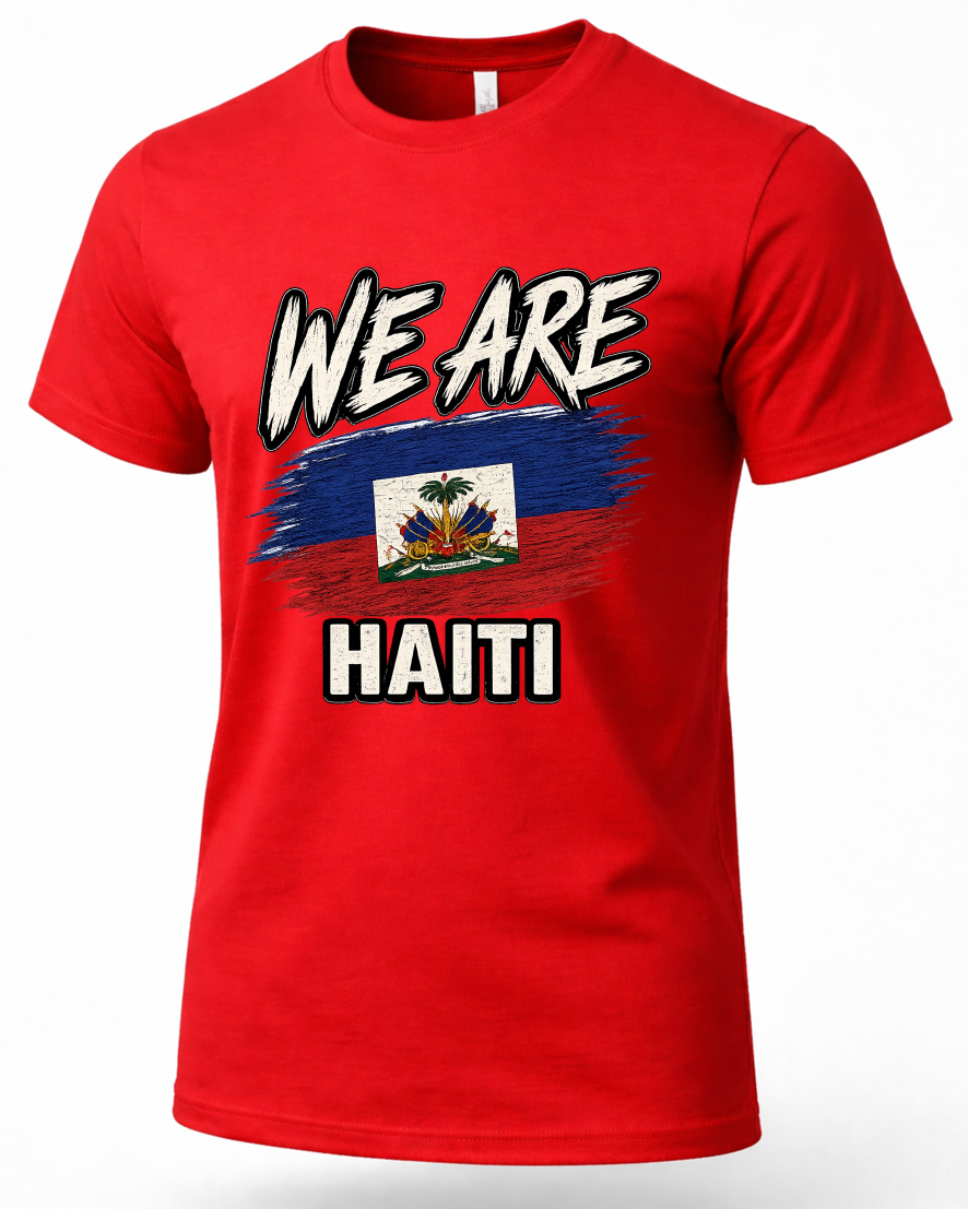 A red short-sleeve crewneck t-shirt featuring a graphic print on the front with the text 'WE ARE HAITI' and a stylized Haitian flag.
