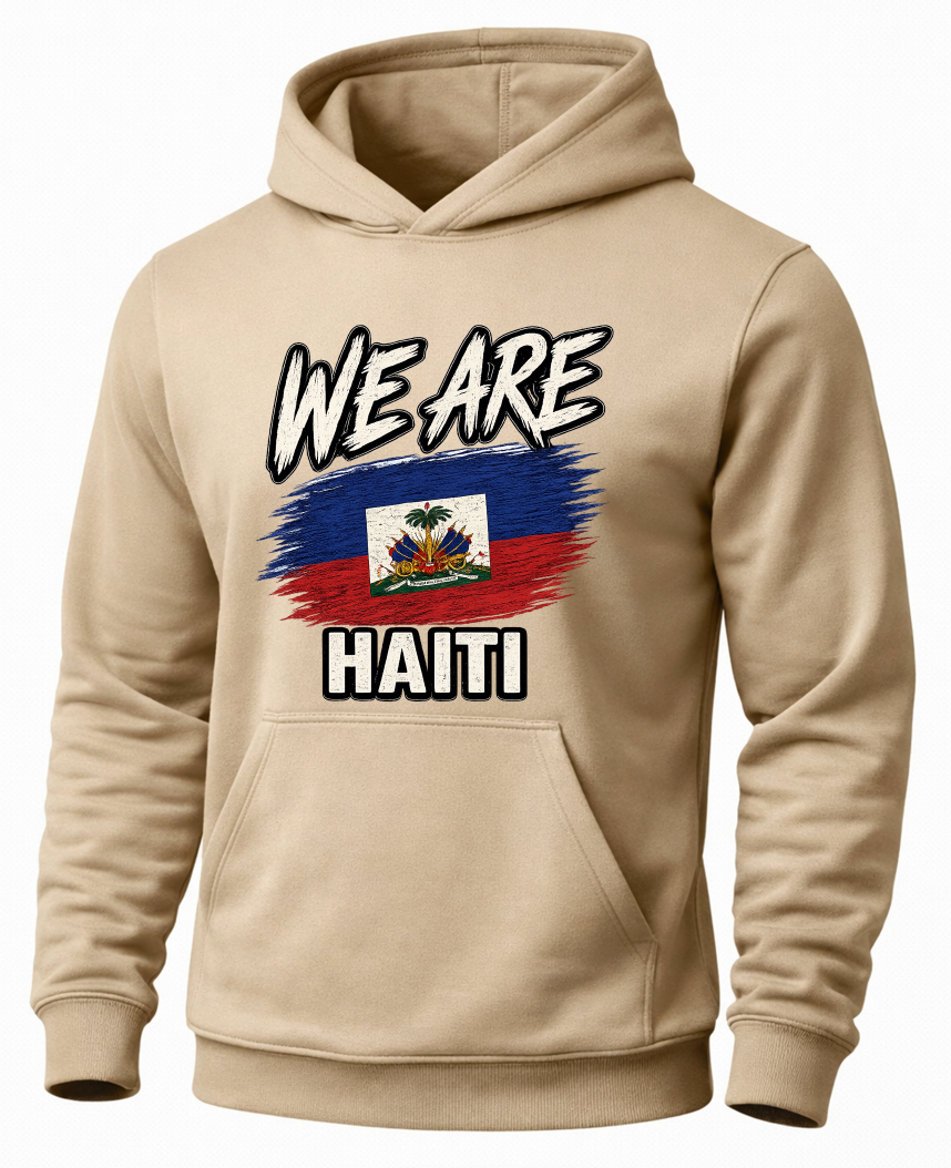 A beige pullover hoodie with a graphic on the chest that reads 'WE ARE HAITI' in bold white letters over a Haitian flag design, shown on a plain white background.