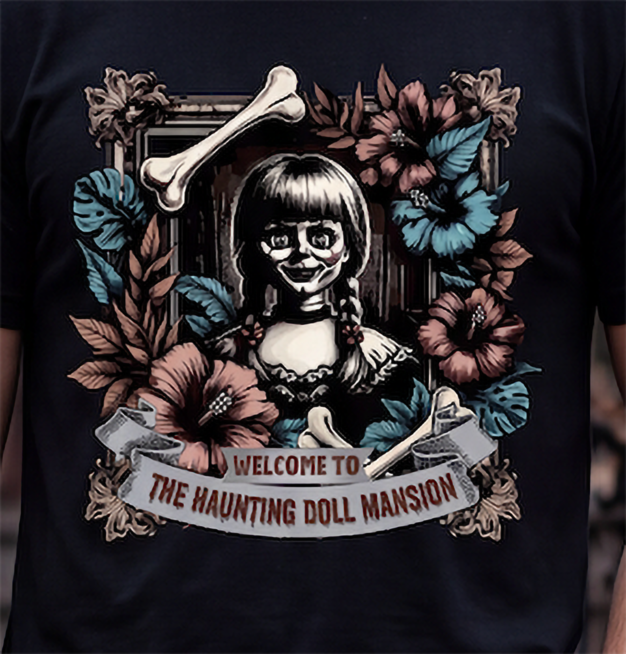 Close-up of haunted doll Halloween graphic on black shirt with gothic floral and bone artwork