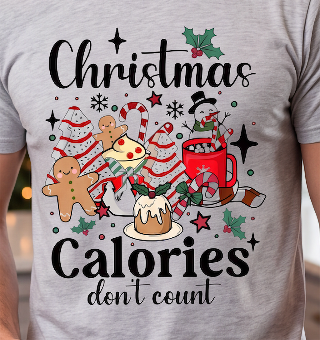 Close-up of heather gray Christmas Calories Don’t Count tee featuring colorful festive food artwork.