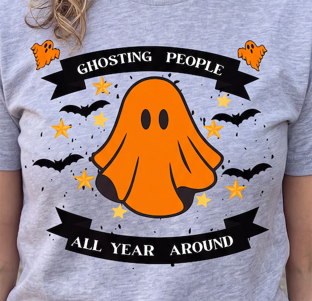 Close-up of gray Ghosting People Halloween shirt with orange ghost and bats design
