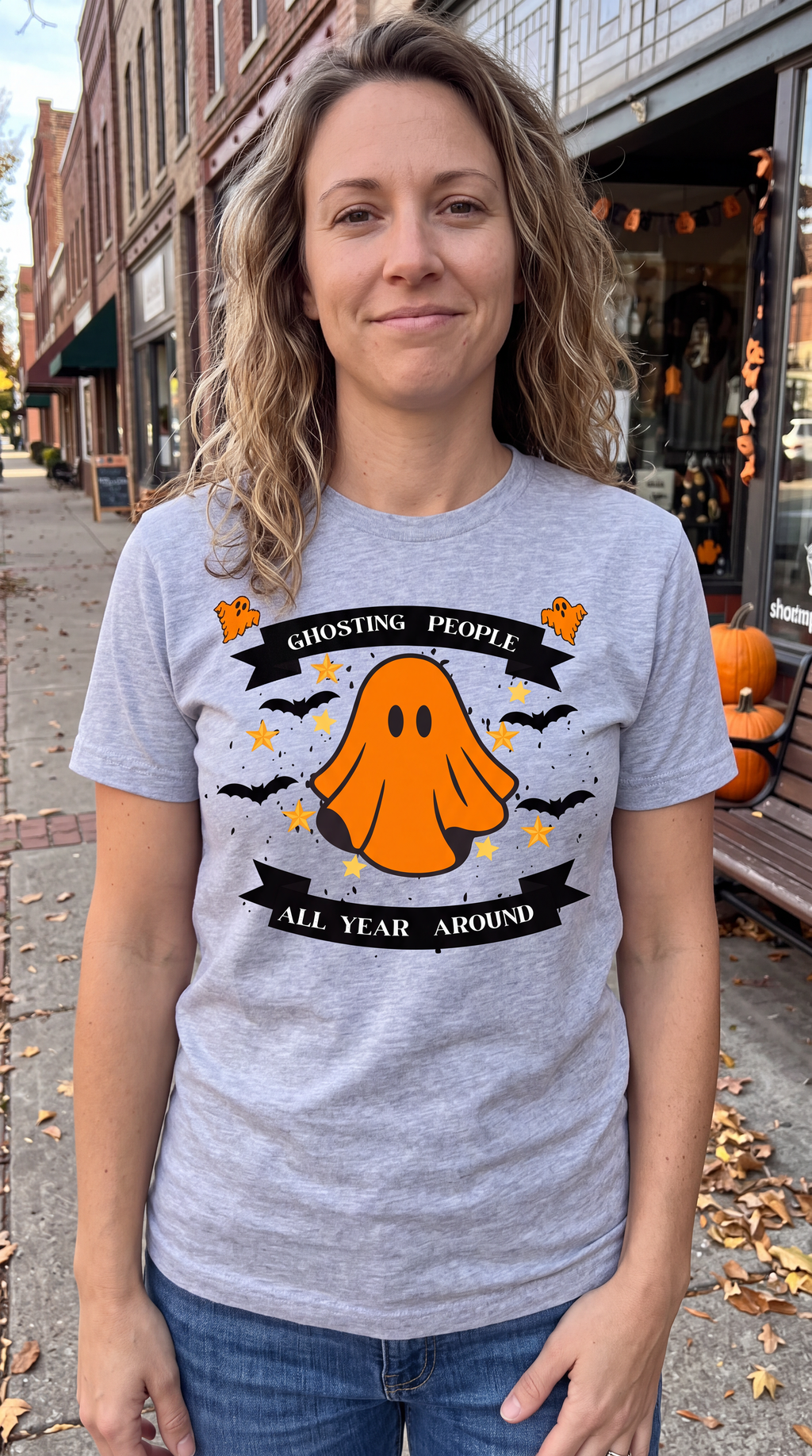 Woman wearing heather gray Ghosting People All Year Round Halloween shirt