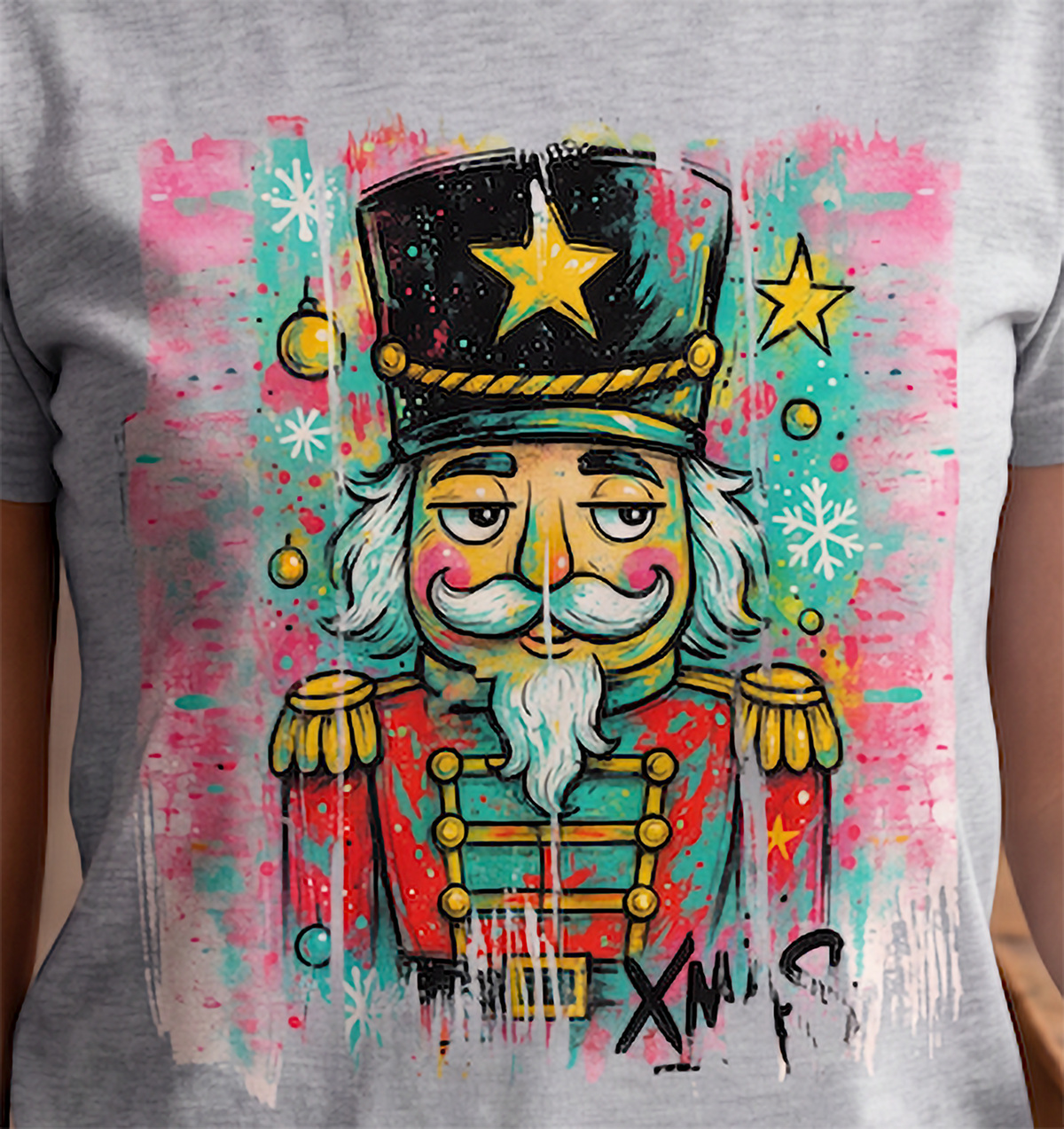 Close-up of graffiti style nutcracker Christmas design on heather gray shirt