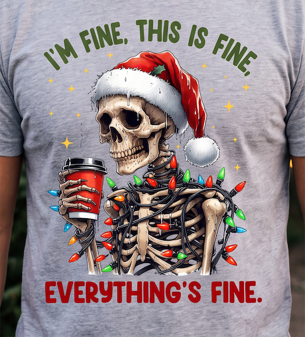 Close-up of I’m Fine Everything’s Fine Christmas skeleton design on heather gray shirt.