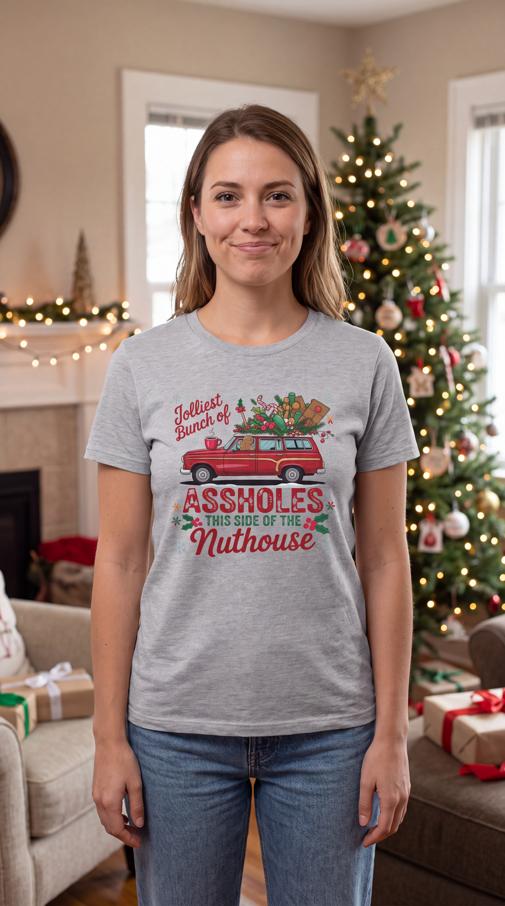 Woman wearing heather gray Jolliest Bunch of Assholes Christmas graphic tee.