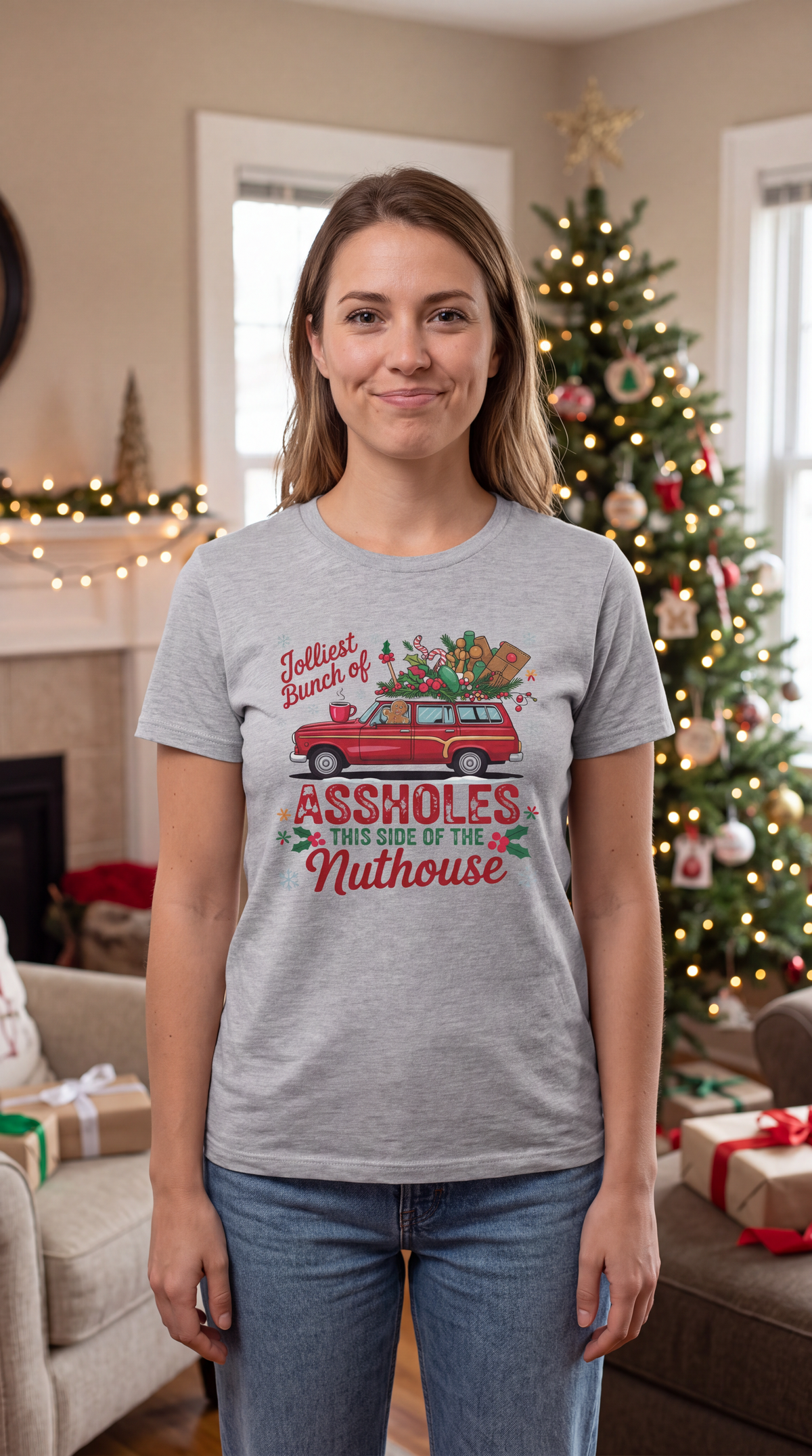 Woman wearing heather gray Jolliest Bunch of Assholes Christmas graphic tee.