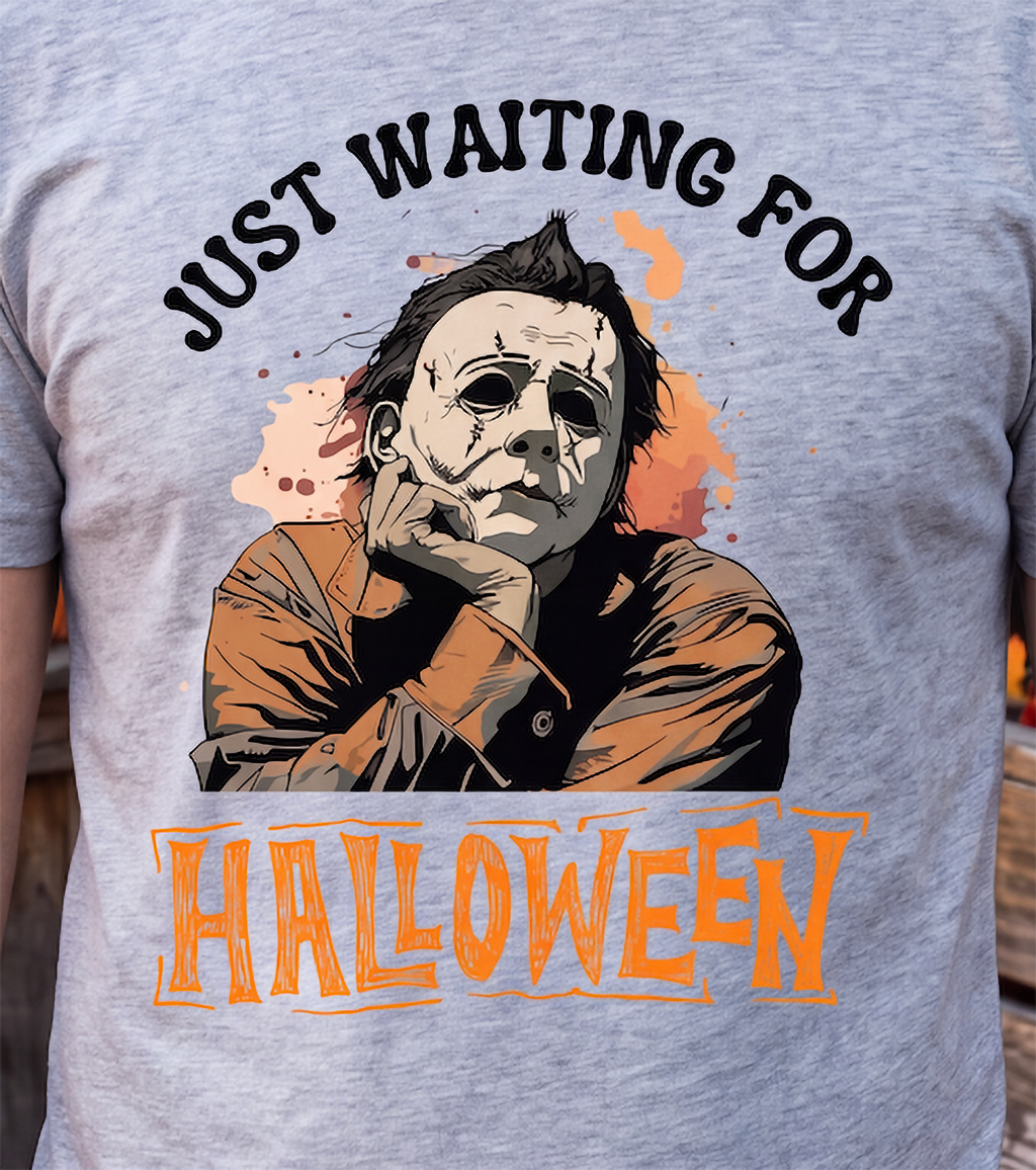 Close-up of heather gray Michael Myers Halloween shirt with horror design