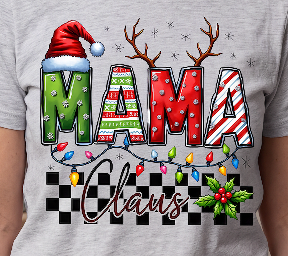 Close-up of heather gray Mama Claus Christmas shirt with MAMA lettering, Christmas lights and checkered design.