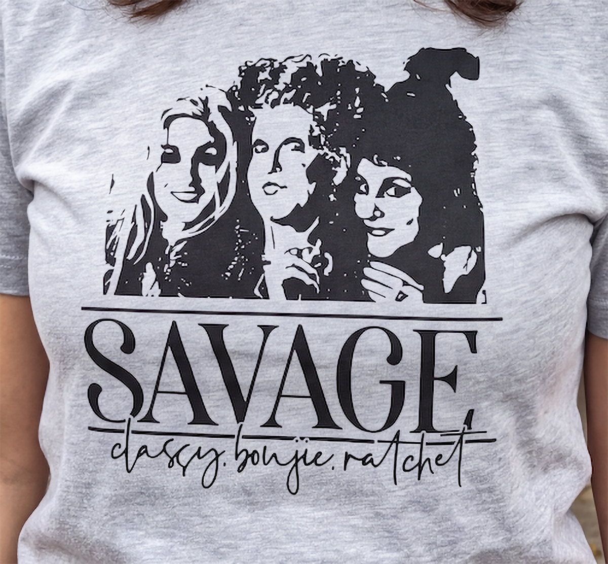 Close-up of gray Savage Hocus Pocus Halloween shirt with Sanderson Sisters design