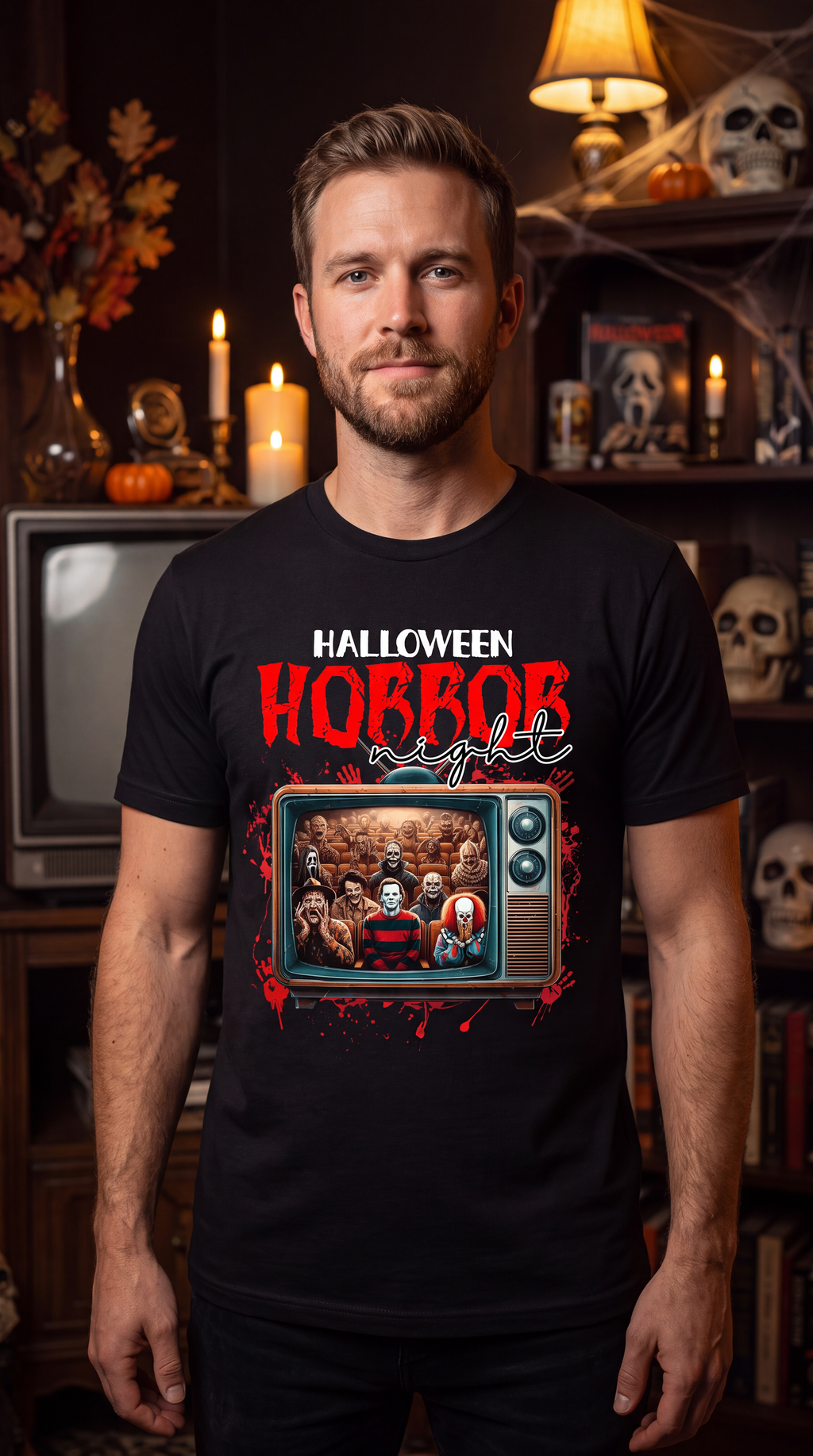 Man wearing black horror movie Halloween shirt with retro TV graphic, slasher-inspired figures and red splatter design