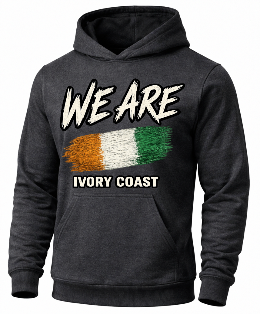 A dark charcoal gray hoodie featuring a graphic print on the front with the text 'WE ARE' above a distressed tricolor flag in orange, white, and green, and 'IVORY COAST' below.