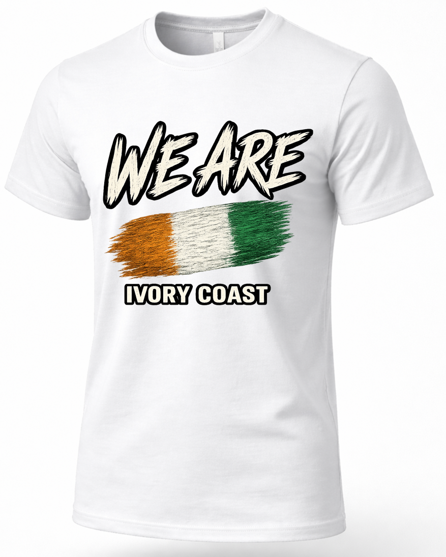 A white short-sleeve crewneck t-shirt featuring a graphic print on the front. The design displays the text 'WE ARE' in a bold, black-and-white hand-drawn style above a textured, brush-stroke style tricolor flag of Ivory Coast (orange, white, green) with 'IVORY COAST' printed below in black.