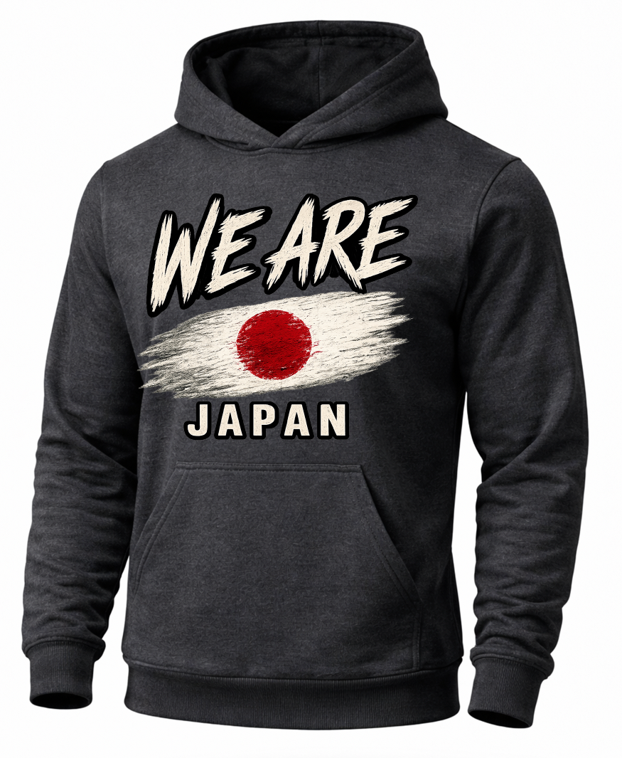 A dark charcoal gray hoodie featuring a distressed graphic print of the Japanese flag with the text 'WE ARE' above and 'JAPAN' below, displayed on a clean white background.
