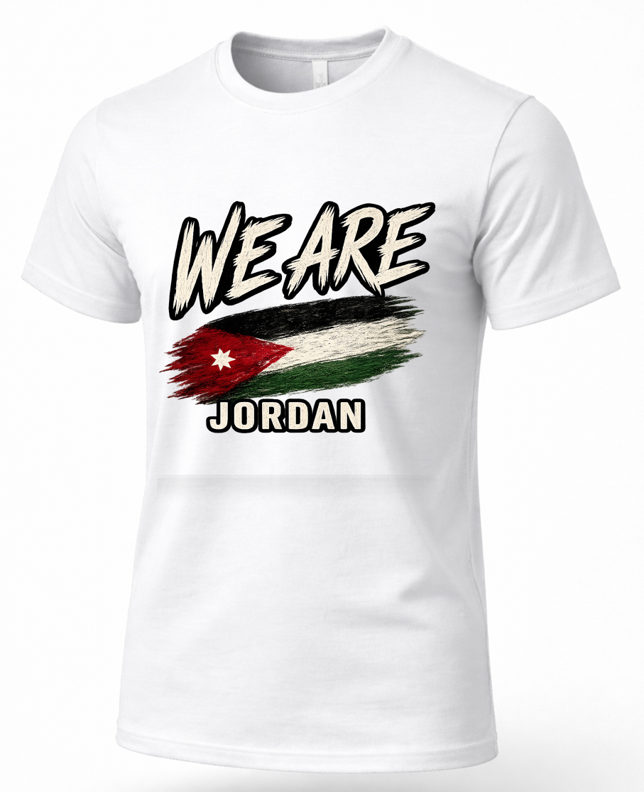 A white short-sleeve crewneck t-shirt featuring a graphic print on the front. The design displays the text 'WE ARE' in a distressed black and white font, above a stylized, textured Jordan flag, and the word 'JORDAN' below in black with a white outline.