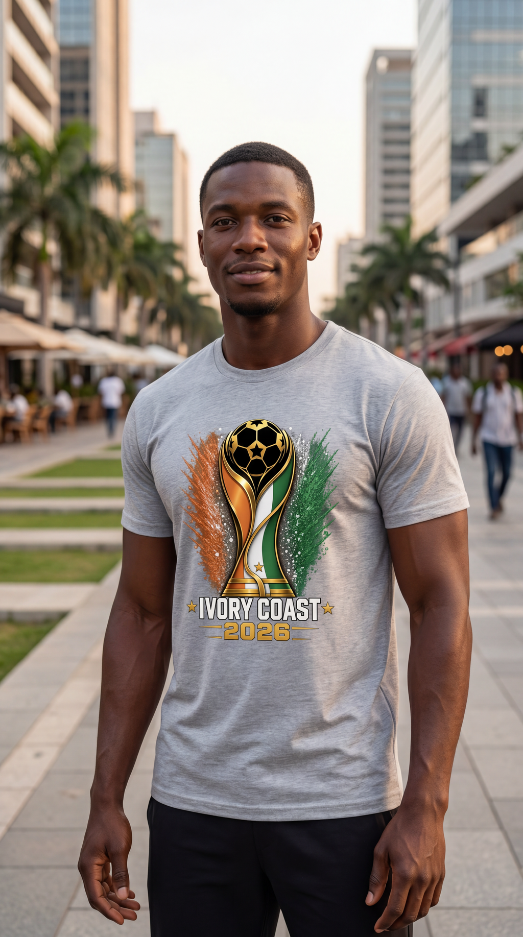 Man wearing a gray t-shirt with Paraguay 2023 design on a city street.