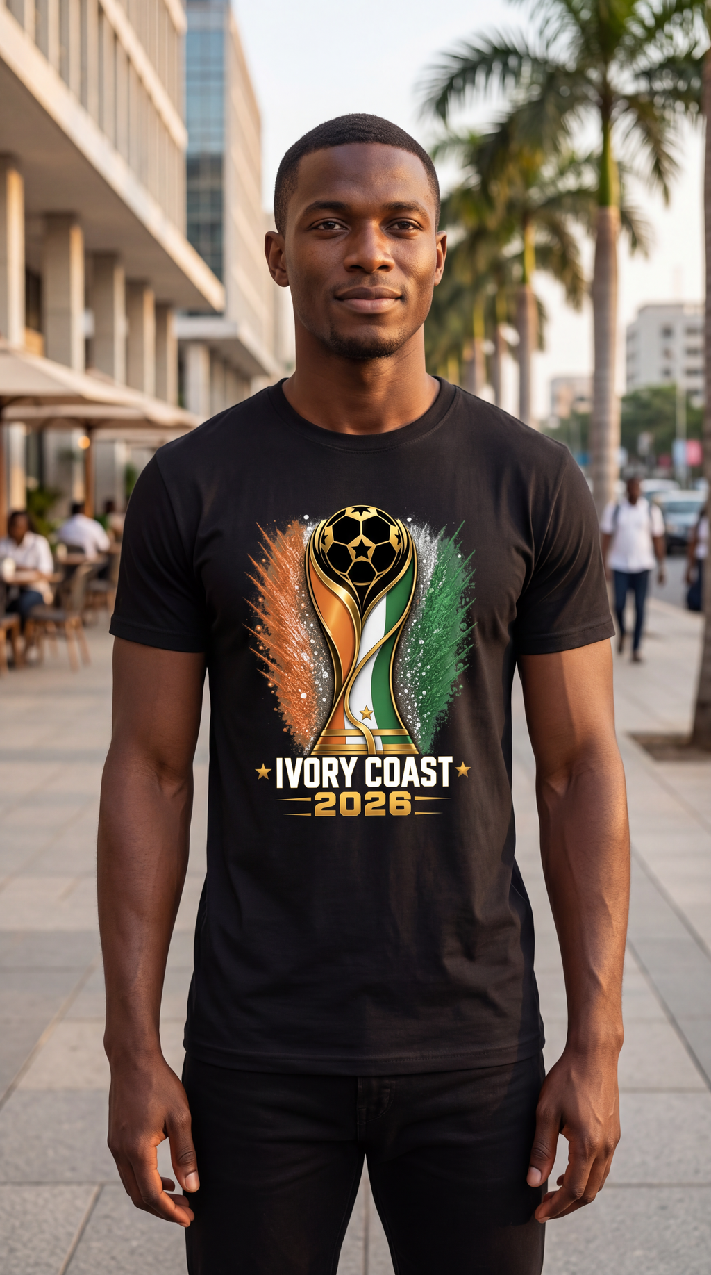 Man wearing a black t-shirt with Paraguay 2028 design on a city street.