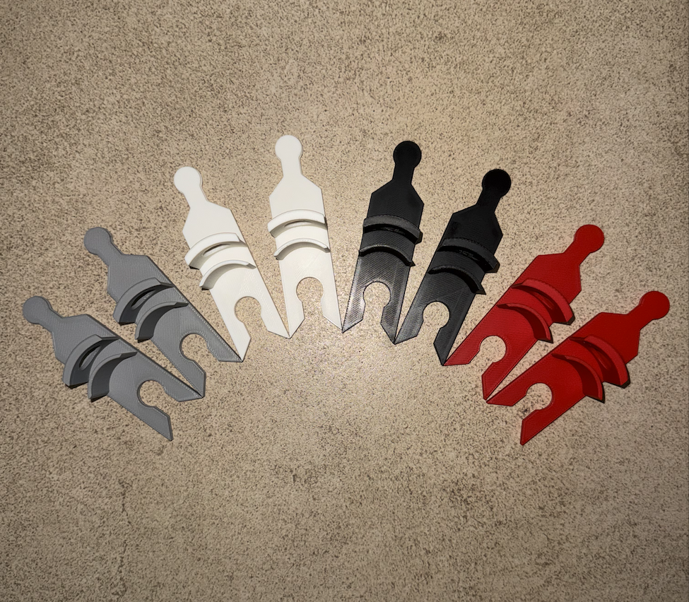 Modular hat rack expansion pieces in gray, white, black, and red for expandable baseball cap, fitted hat, and snapback storage organizer system