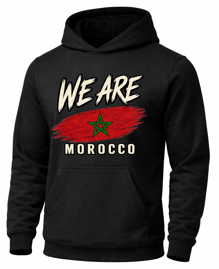 A black pullover hoodie featuring a distressed graphic print on the front with the text 'WE ARE MOROCCO' and a red brushstroke design containing the green Morocco star.