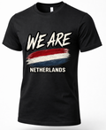 A black short-sleeve crewneck t-shirt featuring a distressed graphic print of the words 'WE ARE' in white brush lettering above a red, white, and blue horizontal flag design, with 'NETHERLANDS' printed below in white.
