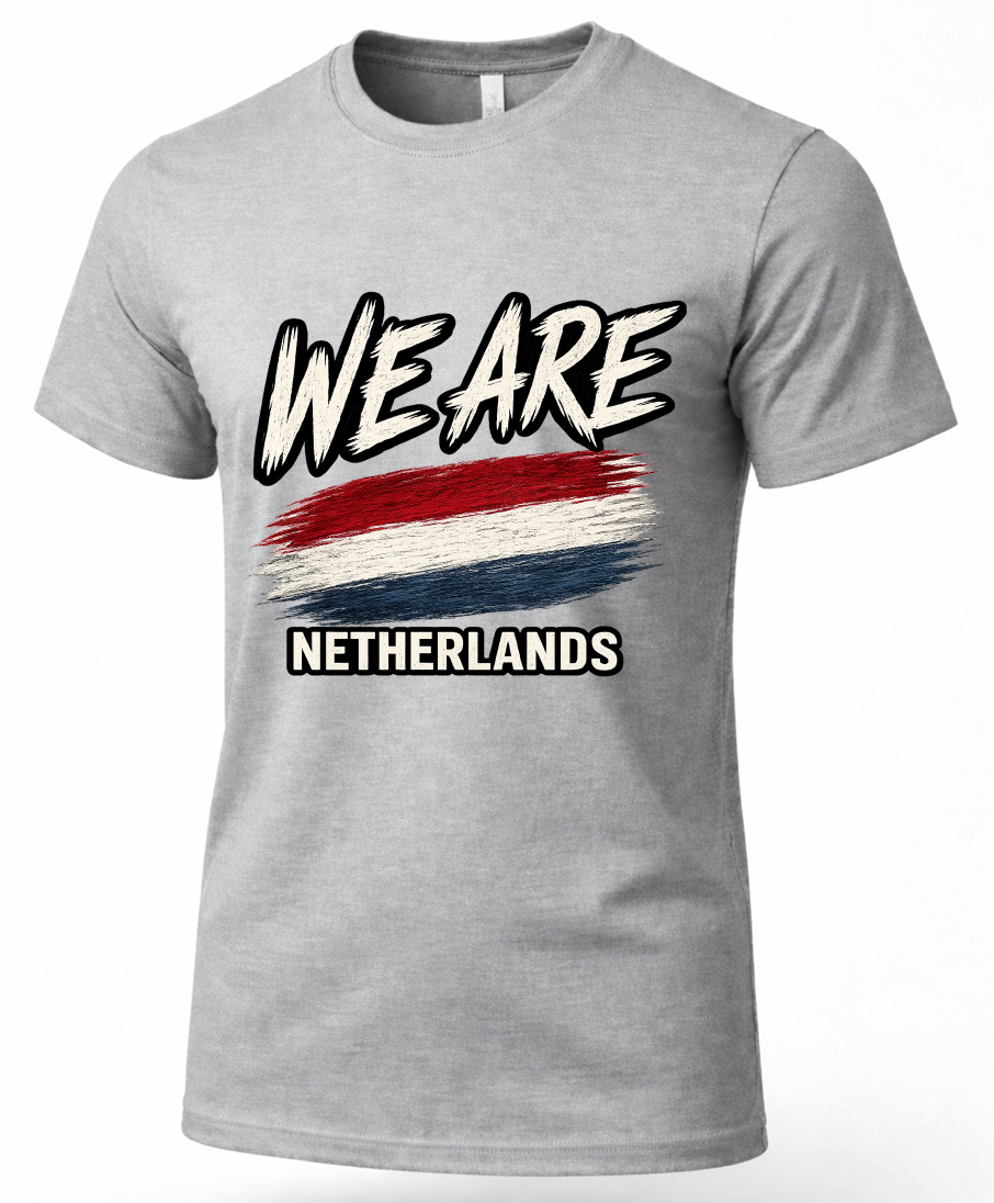 A heather gray short-sleeve crewneck t-shirt featuring a graphic print with the text 'WE ARE' in a stylized black-and-white font, a distressed red, white, and blue horizontal stripe resembling the Dutch flag, and 'NETHERLANDS' in white text with a black outline below.