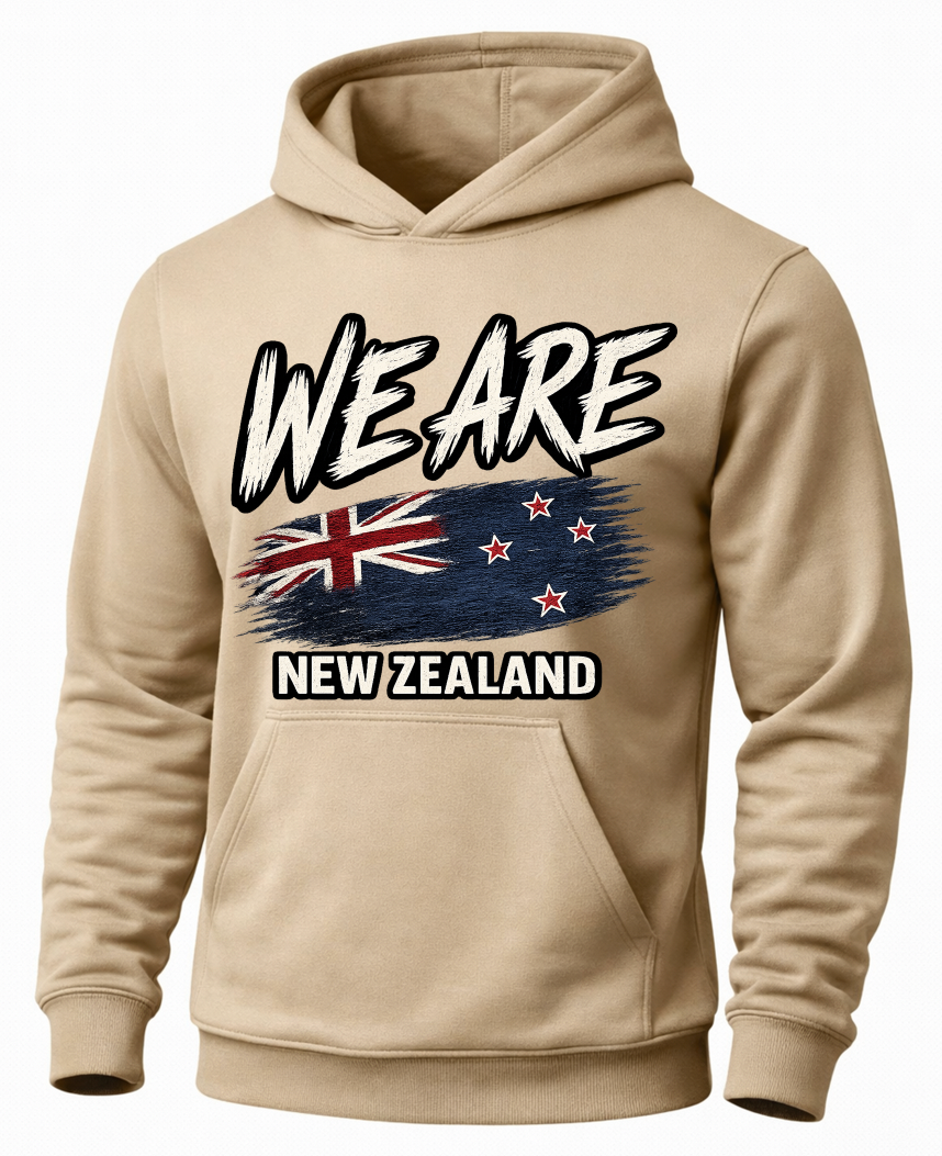A beige pullover hoodie with a front graphic that reads 'WE ARE NEW ZEALAND' above and below a stylized New Zealand flag, shown on a plain light gray background.