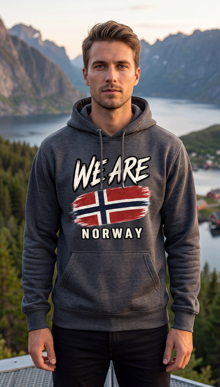 A man wearing a dark gray hoodie with a 'WE ARE NORWAY' graphic featuring the Norwegian flag, set against a scenic mountain and lake background.