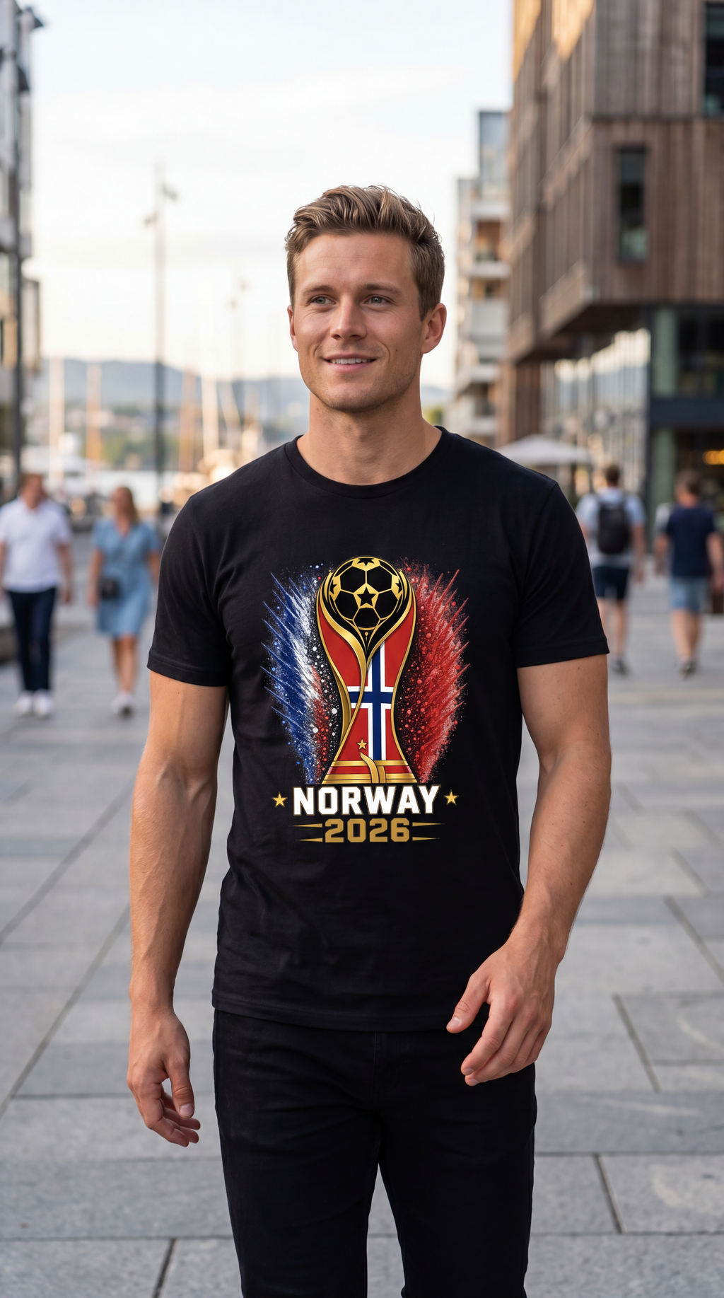 Man wearing a black t-shirt with a soccer-themed design and 'Norway 2026' text, standing on a city street.