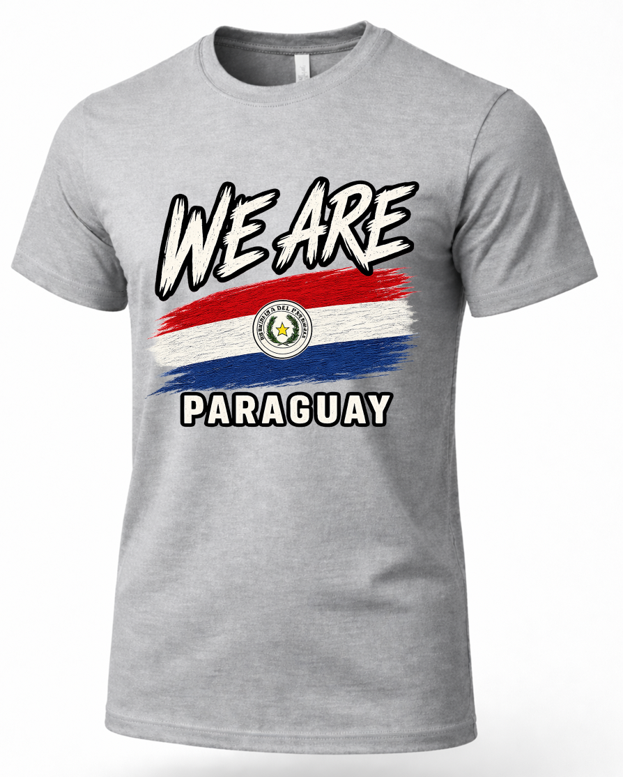 A heather gray short-sleeve t-shirt with a graphic on the front featuring the text 'WE ARE' above a distressed red, white, and blue flag design with the Paraguayan coat of arms, and 'PARAGUAY' below.
