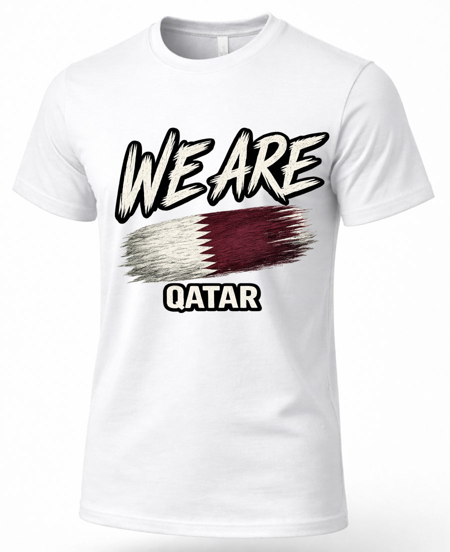 A white short-sleeve crewneck t-shirt featuring a graphic print of the word 'WE ARE' in a stylized black and white brush font, above a horizontal Qatar flag design, with 'QATAR' printed below in black and white.