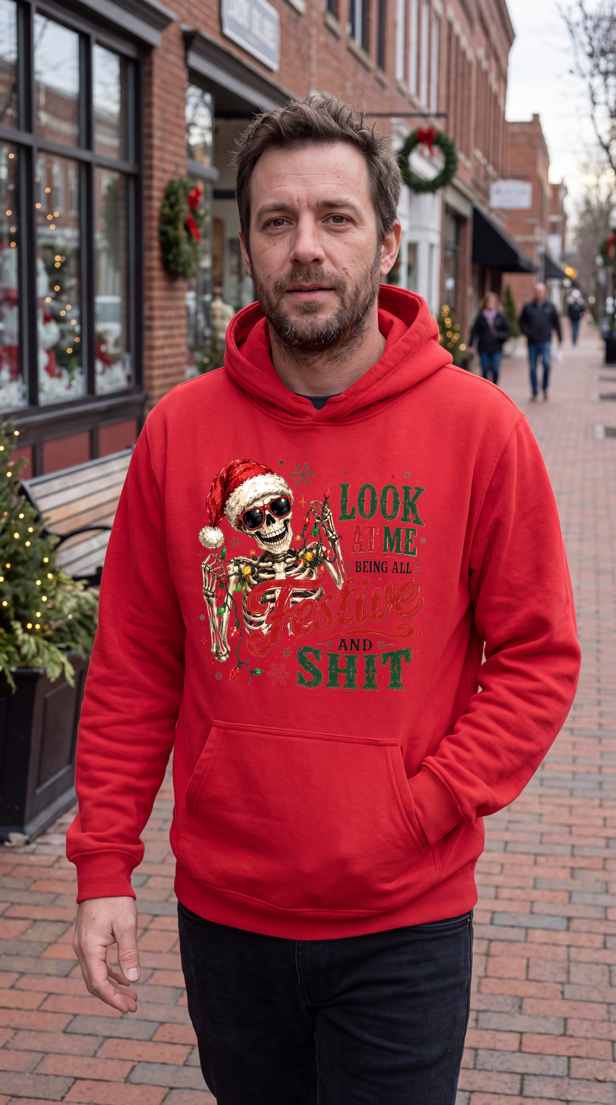 Man wearing red Christmas skeleton hoodie with All Festive and Shit design
