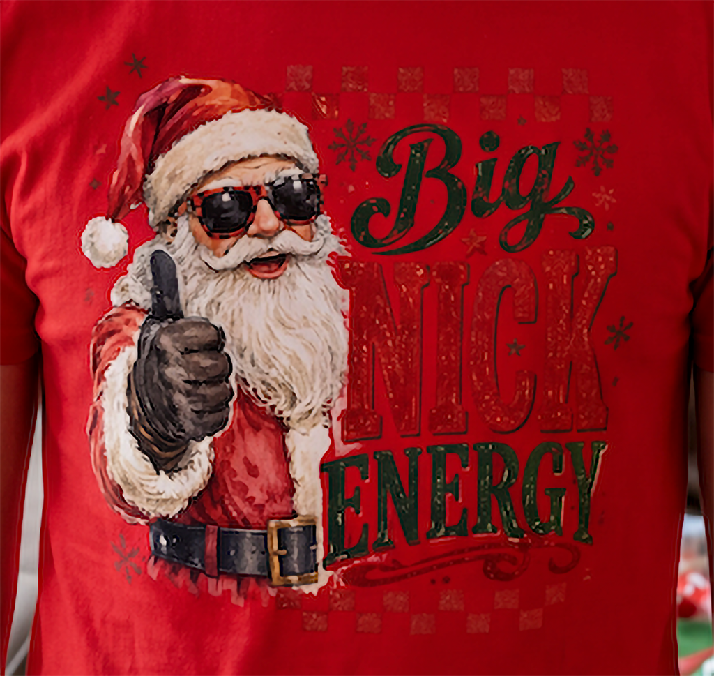 Close-up of Big Nick Energy funny Santa Christmas graphic on red shirt