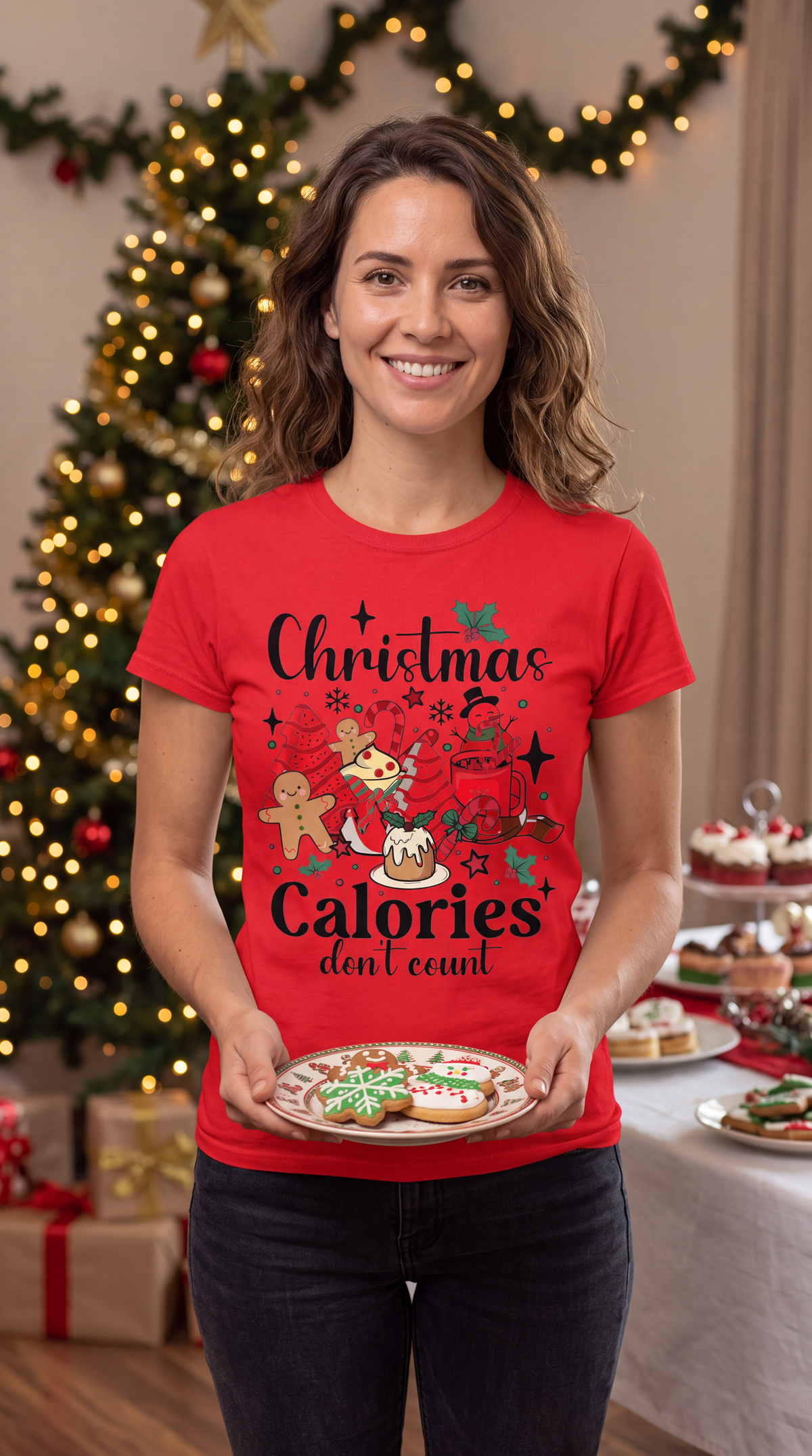 Woman wearing red Christmas Calories Don’t Count graphic tee featuring cookies, cocoa and holiday treats.