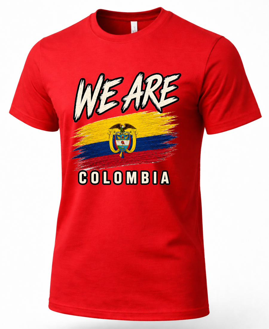 A red short-sleeve crewneck t-shirt featuring a graphic print of the text 'WE ARE' above a stylized Colombian flag and 'COLOMBIA' below, shown on a plain white background.