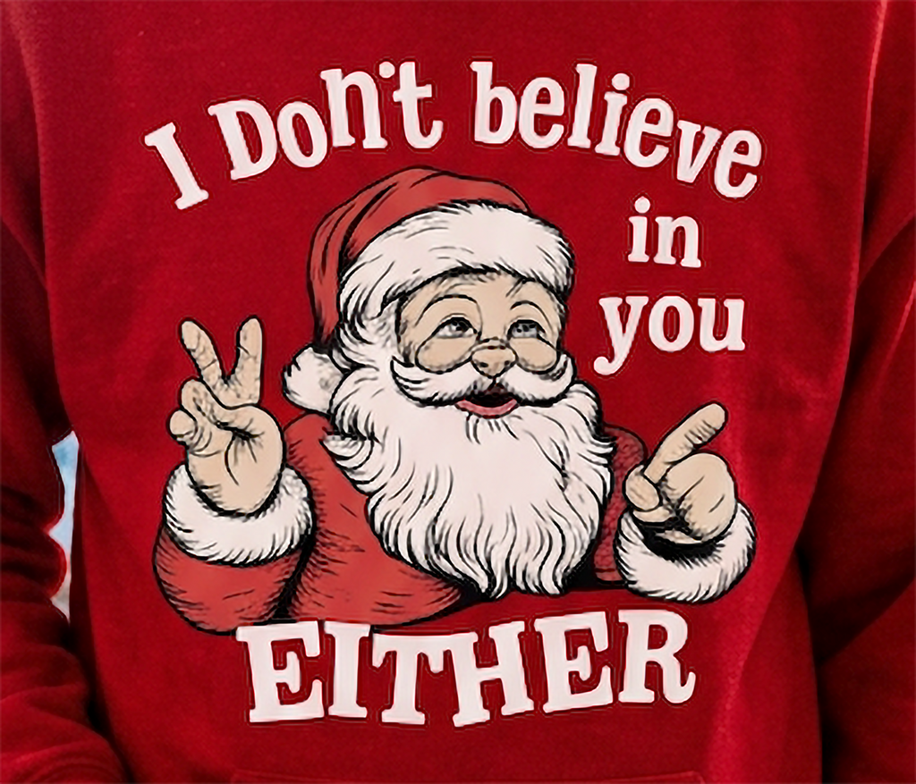 Close-up of I Don’t Believe in You Either Santa graphic on red Christmas hoodie